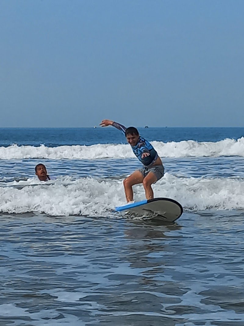 CMJ Surf Lesson & Surfboard Rental